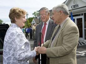 Gov. M. Jodi Rell is greeted by Wayne Mulligan (at left) and Tom Grossi,, May 17, 2010.