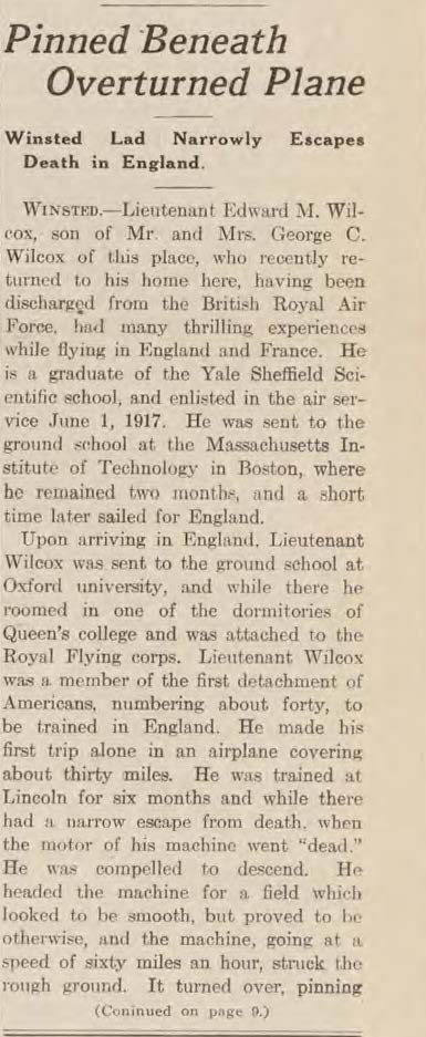 A newspaper clipping titled pinned beneath overturned plane