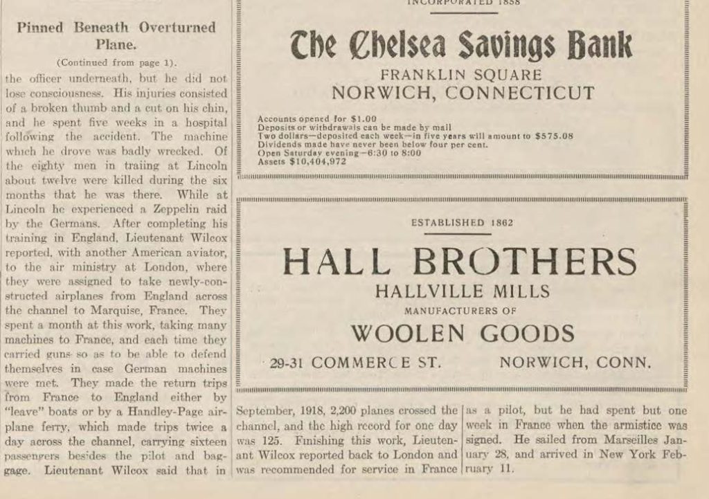 A newspaper clipping titled pinned beneath overturned plane
