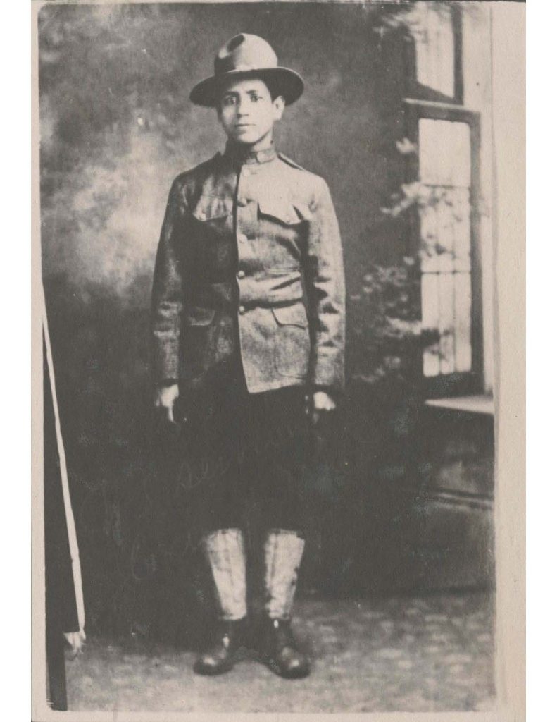 a photo of cristobal rodriquez hildalgo in military uniform and standing near an open window