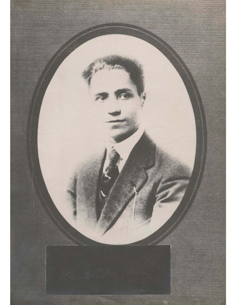 a portrait of cristobal rodriguez hidalgo in a suit an tie, the photo is centered in an oval shaped frame